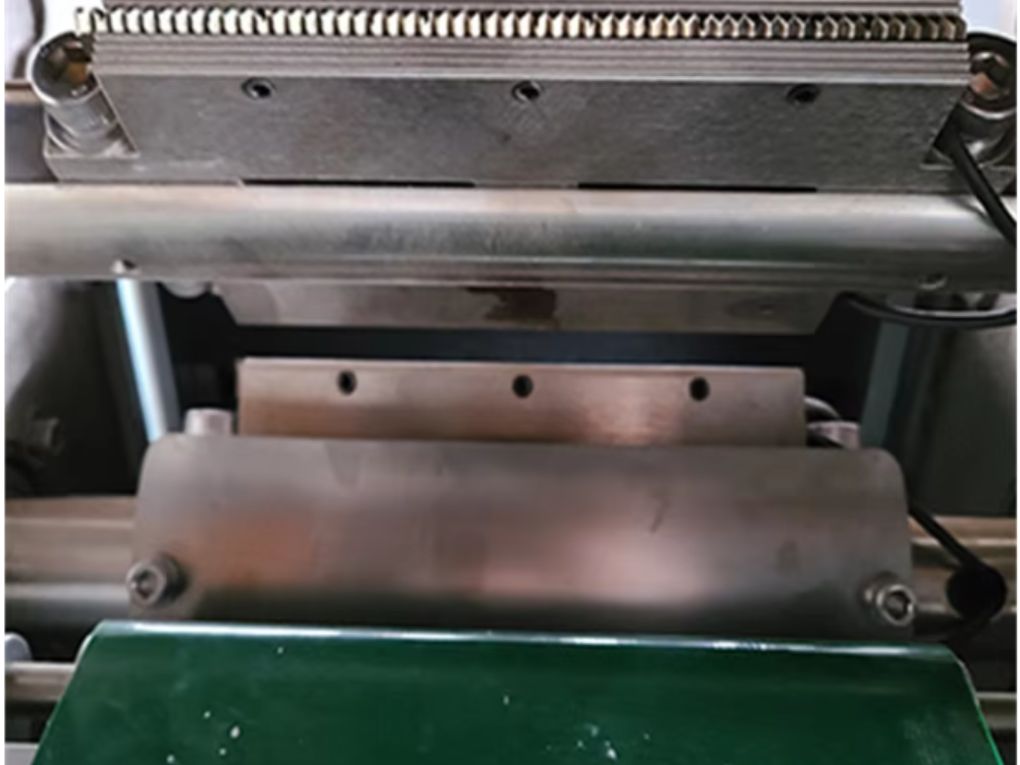 Chi tiết máy đóng gói bánh dừa OP Pack