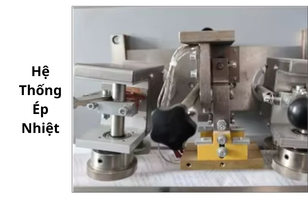 Hệ thống ép nhiệt của máy